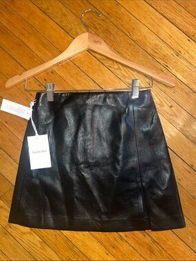 Sunday Best Black Faux Leather Mini Skirt with Clean Panels